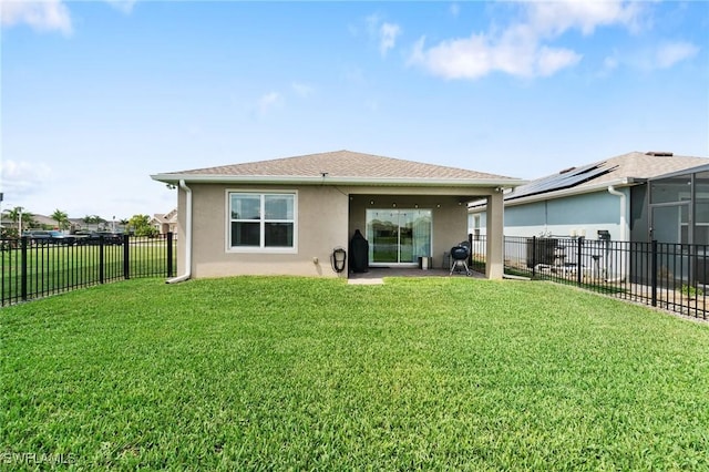 8833 Swell Brooks Ct, North Fort Myers, FL 33917 - back of property featuring stucco siding and a patio area