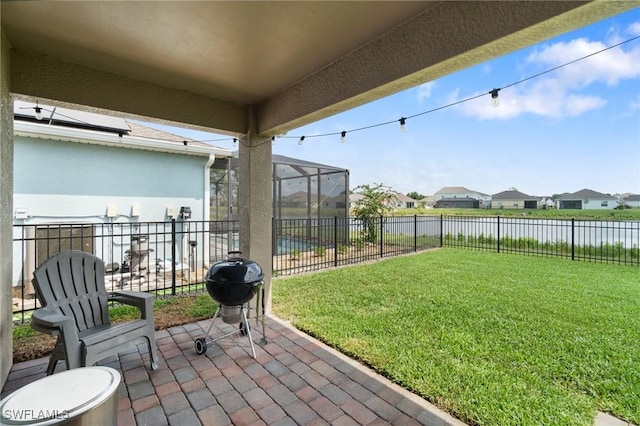 8833 Swell Brooks Ct, North Fort Myers, FL 33917 - view of patio with a water view, a residential view, a lanai, and area for grilling