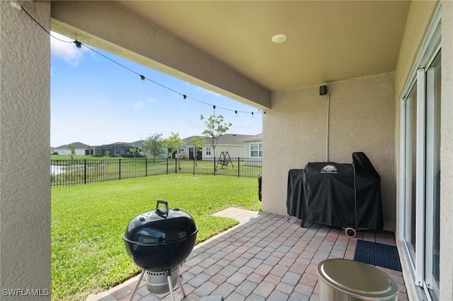 8833 Swell Brooks Ct, North Fort Myers, FL 33917 - view of patio with area for grilling and a residential view