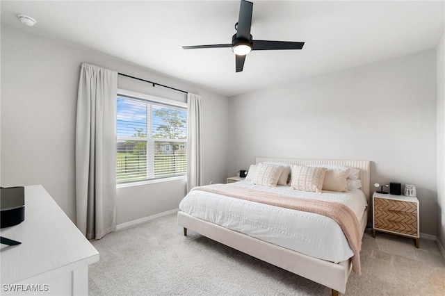 8833 Swell Brooks Ct, North Fort Myers, FL 33917 - bedroom featuring light carpet, baseboards, and ceiling fan