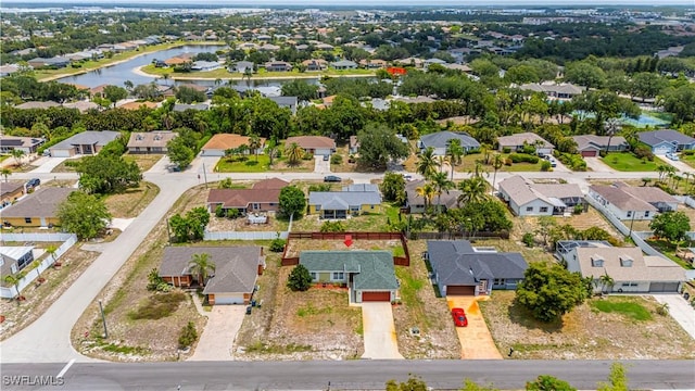 9091 Cypress Dr N, Fort Myers, FL 33967 - aerial view of residential area featuring a nearby body of water