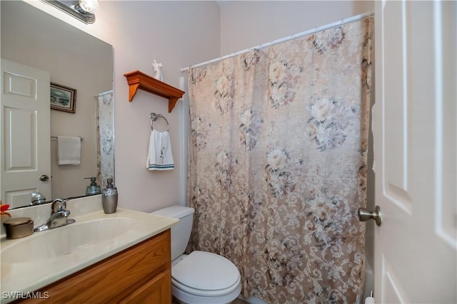 1115 Comet Ave, Labelle, FL 33935 - bathroom featuring vanity, toilet, and curtained shower