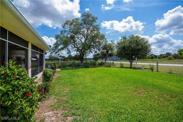 1115 Comet Ave, Labelle, FL 33935 - view of yard with a sunroom
