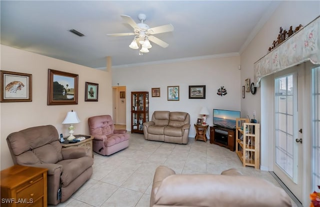 1115 Comet Ave, Labelle, FL 33935 - living room featuring light tile patterned flooring, a ceiling fan, and ornamental molding