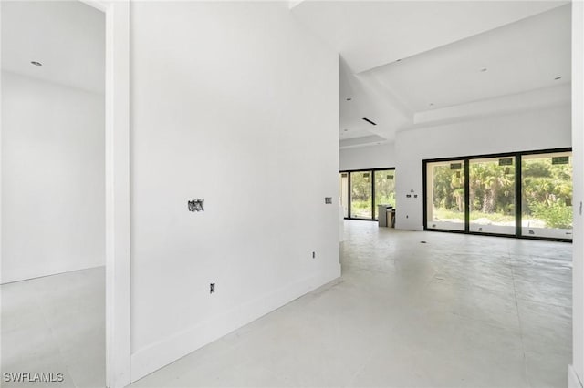 721 Golden Gate Blvd W, Naples, FL 34120 - empty room featuring concrete floors and baseboards