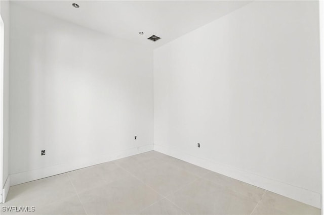 721 Golden Gate Blvd W, Naples, FL 34120 - spare room featuring light tile patterned floors and baseboards
