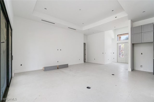 721 Golden Gate Blvd W, Naples, FL 34120 - spare room with a raised ceiling and concrete flooring