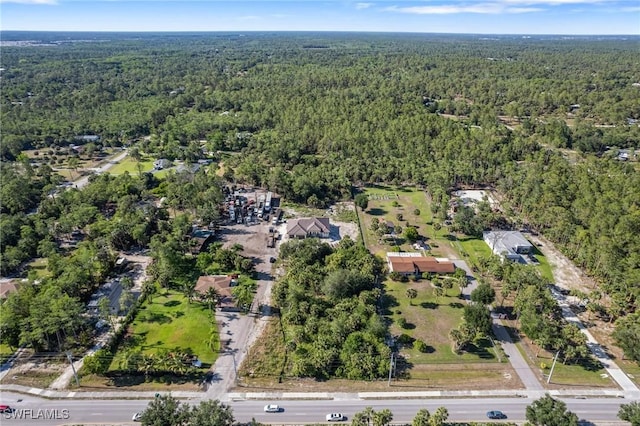 721 Golden Gate Blvd W, Naples, FL 34120 - aerial overview of property's location with a forest