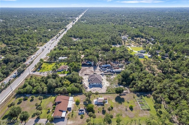 721 Golden Gate Blvd W, Naples, FL 34120 - aerial view of property's location with a heavily wooded area