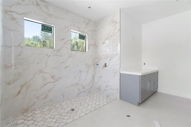 721 Golden Gate Blvd W, Naples, FL 34120 - full bathroom with vanity and a marble finish shower