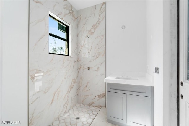 721 Golden Gate Blvd W, Naples, FL 34120 - bathroom featuring vanity and a marble finish shower