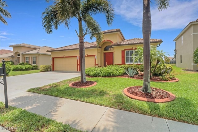 3032 Lake Manatee Ct, Cape Coral, FL 33909 - mediterranean / spanish house with an attached garage, stucco siding, a front yard, and concrete driveway