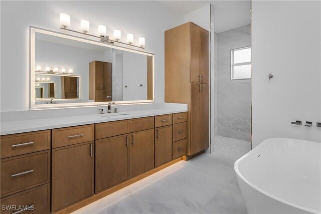 2854 Coach House Way, Naples, FL 34105 - full bath with a freestanding tub, vanity, a shower, and tile patterned flooring