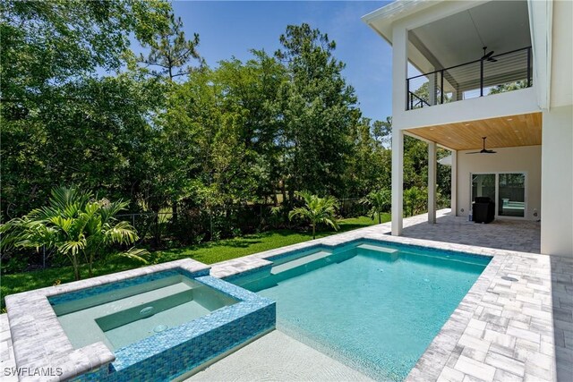 2854 Coach House Way, Naples, FL 34105 - view of pool with a ceiling fan, a patio area, a fenced backyard, and a pool with connected hot tub