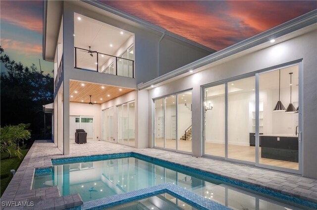 2854 Coach House Way, Naples, FL 34105 - view of swimming pool featuring a patio, ceiling fan, and a pool with connected hot tub