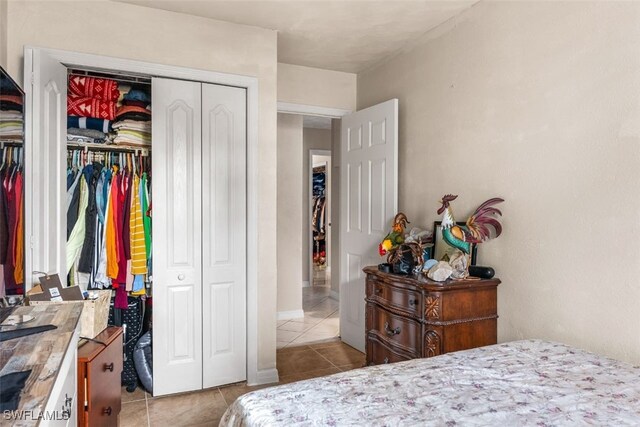 1154 4th Way N, Fort Myers, FL 33903 - bedroom featuring tile patterned flooring and a closet