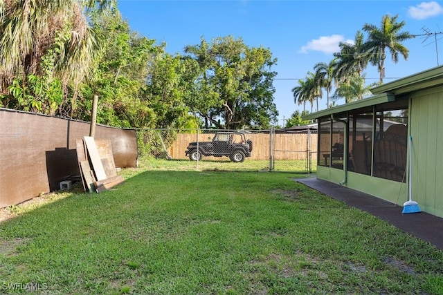 1154 4th Way N, Fort Myers, FL 33903 - view of yard featuring a sunroom