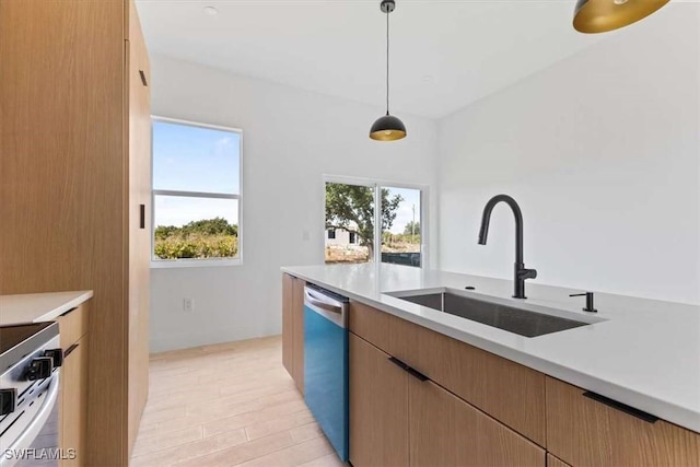 2902 61st St W, Lehigh Acres, FL 33971 - kitchen featuring a sink, dishwasher, stainless steel range oven, light countertops, and pendant lighting