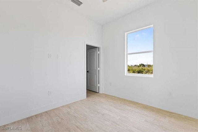 2902 61st St W, Lehigh Acres, FL 33971 - unfurnished room featuring wood finished floors