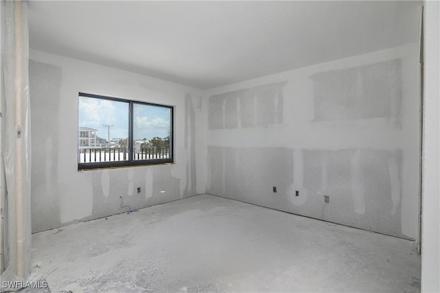 538 Estero Blvd Unit 102, Fort Myers Beach, FL 33931 - empty room with unfinished concrete floors