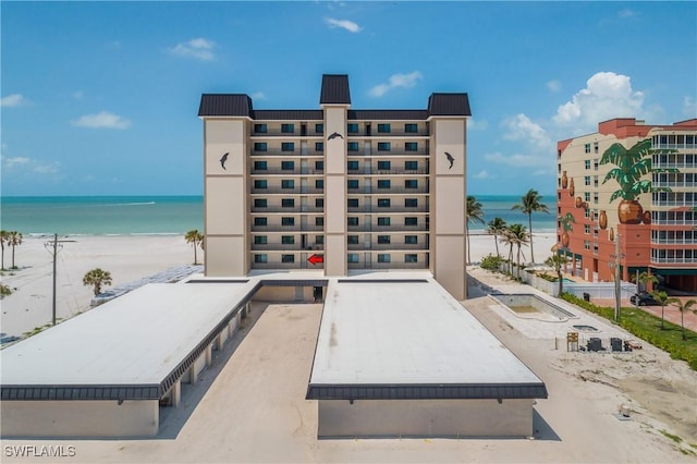 538 Estero Blvd Unit 102, Fort Myers Beach, FL 33931 - view of apartment building / complex with view of water and beach