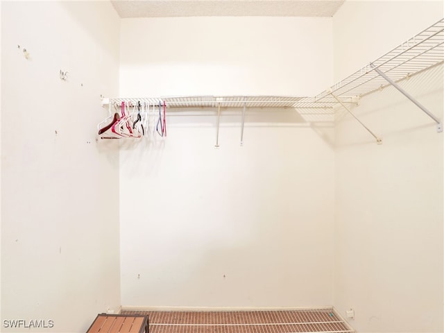 5479 Peppertree Dr Unit 13, Fort Myers, FL 33908 - spacious closet featuring carpet flooring