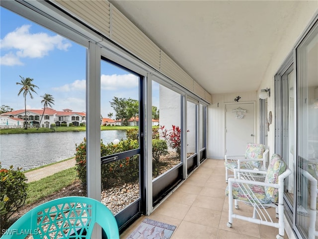5479 Peppertree Dr Unit 13, Fort Myers, FL 33908 - sunroom / solarium featuring a water view and a residential view