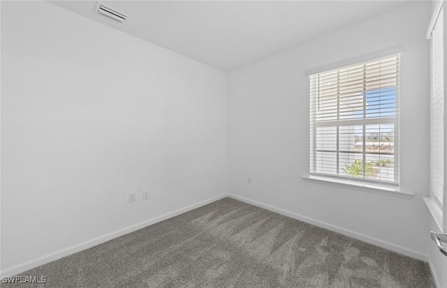 44225 Kelly Dr, Punta Gorda, FL 33982 - empty room featuring carpet flooring and baseboards