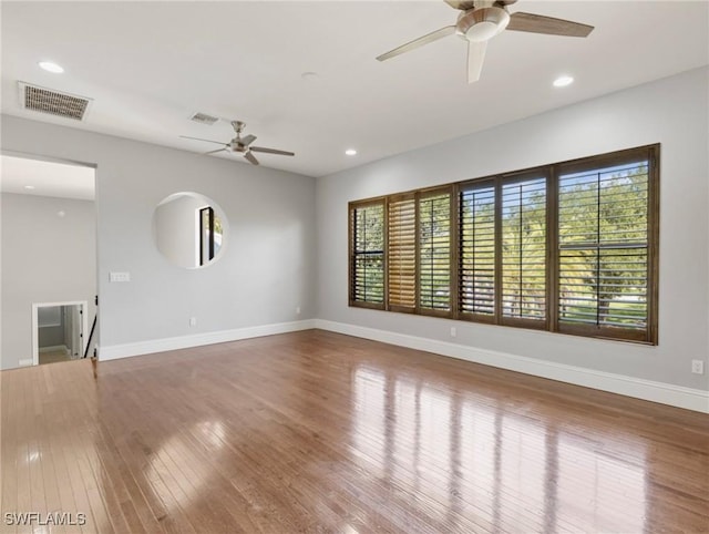 18251 Parkridge Ct, Fort Myers, FL 33908 - unfurnished living room featuring a ceiling fan, wood finished floors, baseboards, and recessed lighting