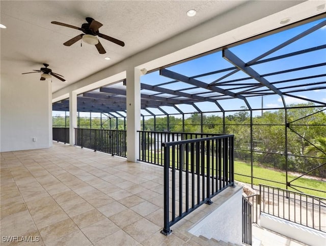 18251 Parkridge Ct, Fort Myers, FL 33908 - view of patio featuring a ceiling fan and glass enclosure