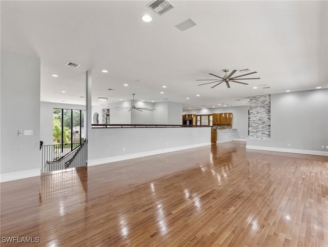 18251 Parkridge Ct, Fort Myers, FL 33908 - unfurnished living room featuring ceiling fan, light wood-style floors, baseboards, and recessed lighting