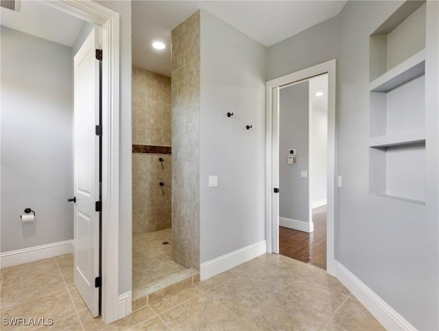 18251 Parkridge Ct, Fort Myers, FL 33908 - full bathroom featuring a walk in shower, built in shelves, baseboards, and recessed lighting
