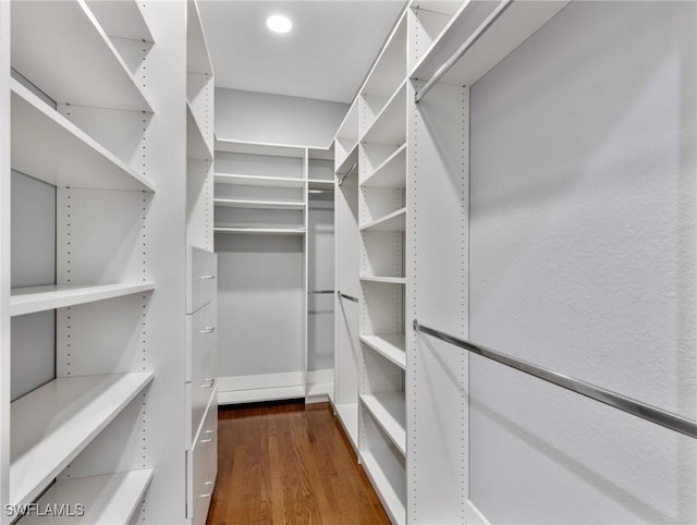 18251 Parkridge Ct, Fort Myers, FL 33908 - walk in closet with dark wood-style floors