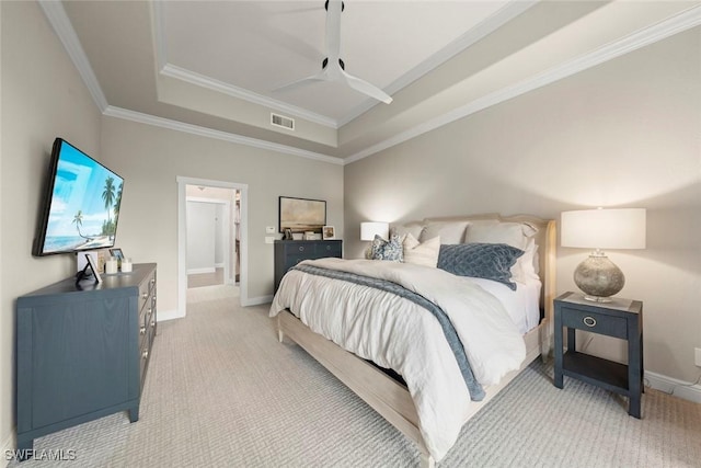 646 Vintage Reserve Cir Unit 4D, Naples, FL 34119 - bedroom with light carpet, ornamental molding, a tray ceiling, baseboards, and a ceiling fan