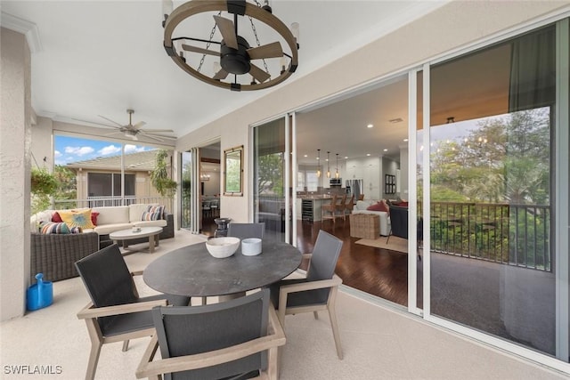 646 Vintage Reserve Cir Unit 4D, Naples, FL 34119 - sunroom featuring a chandelier