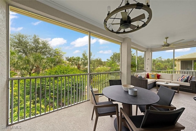 646 Vintage Reserve Cir Unit 4D, Naples, FL 34119 - sunroom / solarium featuring an outdoor hangout area, ceiling fan, and outdoor dining space