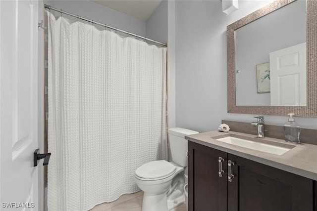 646 Vintage Reserve Cir Unit 4D, Naples, FL 34119 - full bath with vanity, toilet, tile patterned flooring, and a shower with curtain