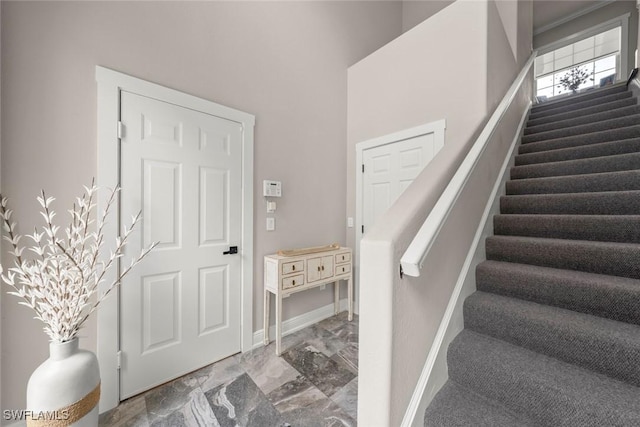 646 Vintage Reserve Cir Unit 4D, Naples, FL 34119 - entrance foyer featuring stairs, baseboards, and marble finish flooring