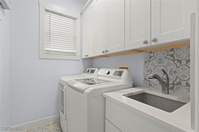 646 Vintage Reserve Cir Unit 4D, Naples, FL 34119 - washroom with cabinet space, washer and dryer, and baseboards
