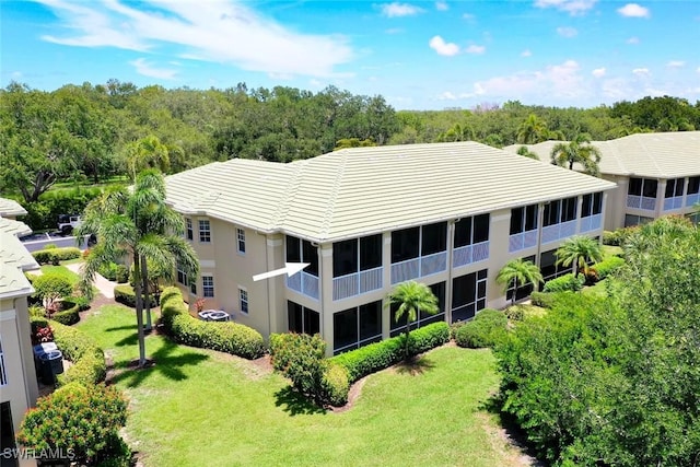 646 Vintage Reserve Cir Unit 4D, Naples, FL 34119 - aerial view of property and surrounding area featuring a forest