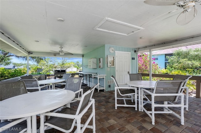 5741 Whitaker Rd Unit D103, Naples, FL 34112 - view of patio / terrace with outdoor dining area and a ceiling fan