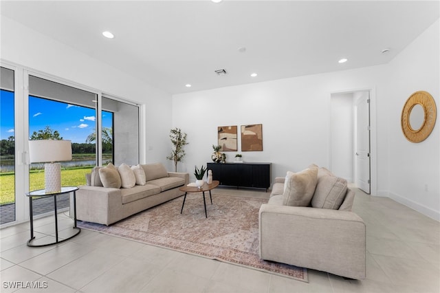 12467 Purple Ficus Way, Naples, FL 34120 - living area featuring recessed lighting and light tile patterned floors