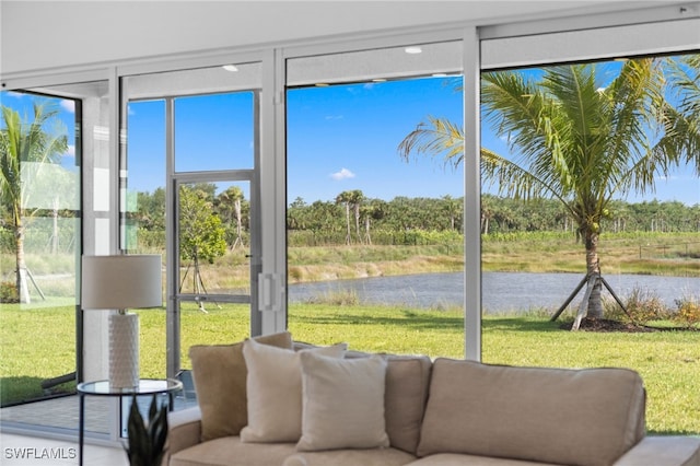 12467 Purple Ficus Way, Naples, FL 34120 - sunroom / solarium featuring a water view