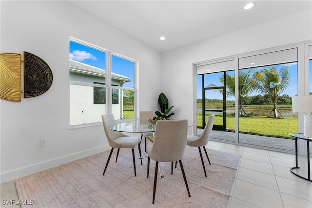 12467 Purple Ficus Way, Naples, FL 34120 - dining area featuring healthy amount of natural light, recessed lighting, baseboards, and light tile patterned flooring
