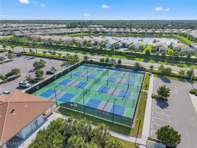 12467 Purple Ficus Way, Naples, FL 34120 - aerial perspective of suburban area with a nearby body of water
