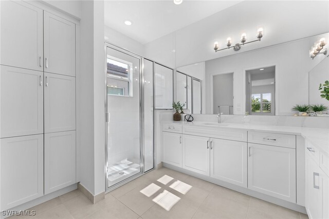 12467 Purple Ficus Way, Naples, FL 34120 - bathroom featuring a stall shower, vanity, tile patterned floors, and recessed lighting