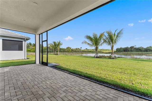 12467 Purple Ficus Way, Naples, FL 34120 - unfurnished sunroom with a water view