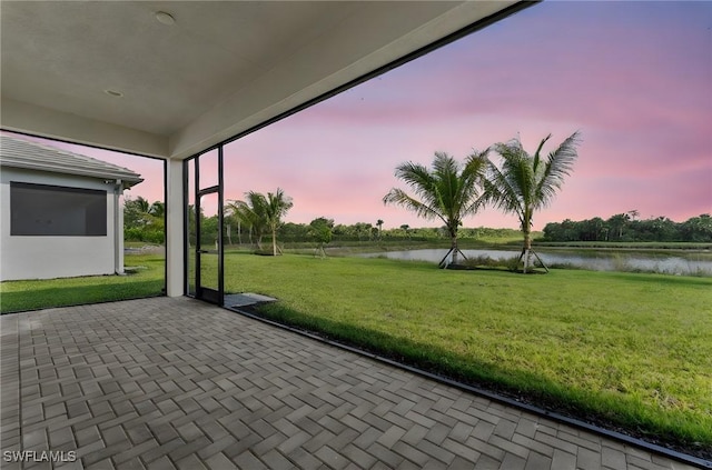 12467 Purple Ficus Way, Naples, FL 34120 - unfurnished sunroom with a water view