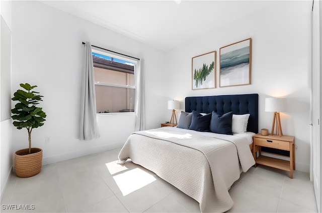 12467 Purple Ficus Way, Naples, FL 34120 - bedroom featuring baseboards