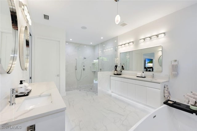 1167 22nd Ave N, Naples, FL 34103 - full bath featuring a marble finish shower, marble look tile flooring, a freestanding bath, and double vanity